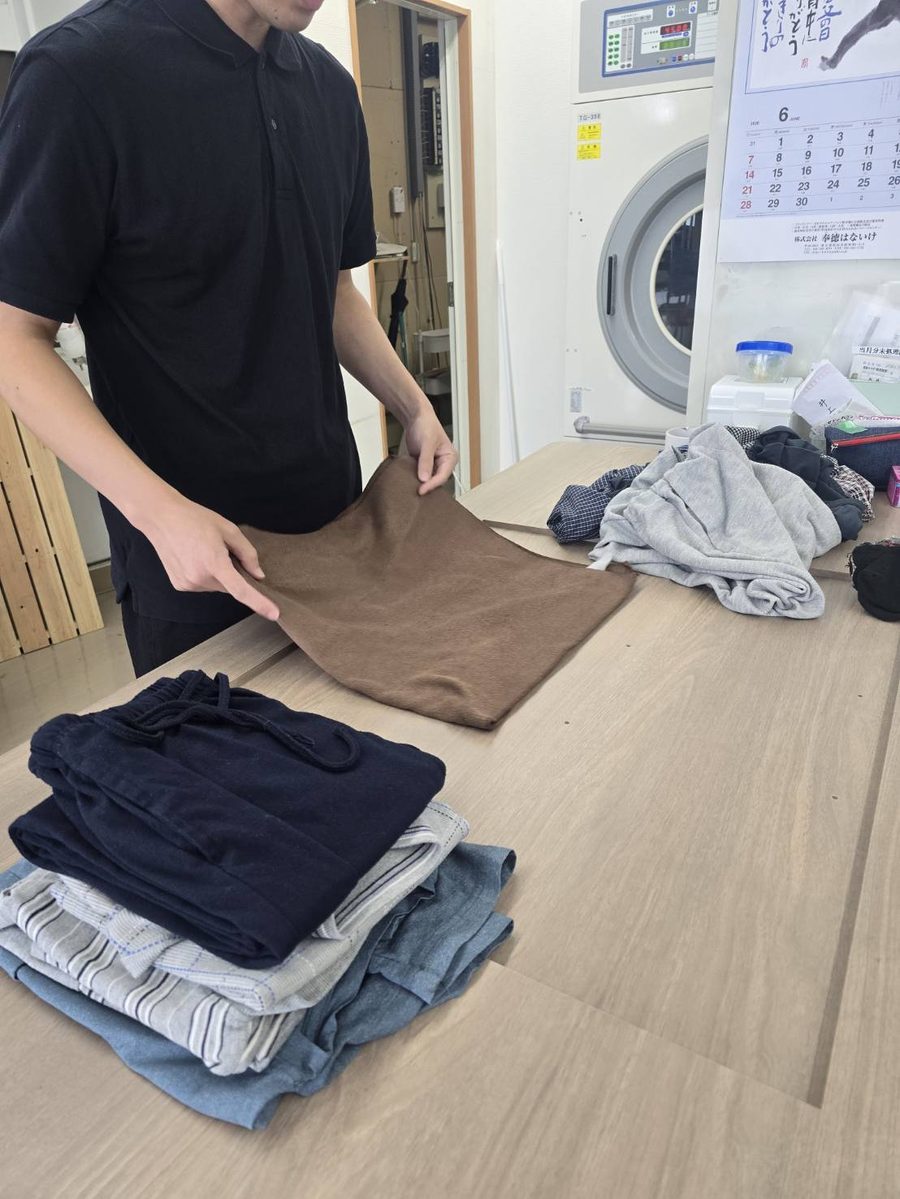 CareWashのたたみ作業の実際の写真